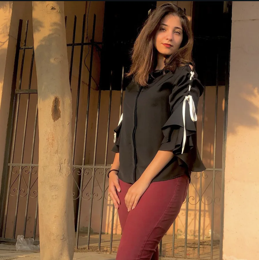 Teema Bashar Alakel, styled outdoor portrait